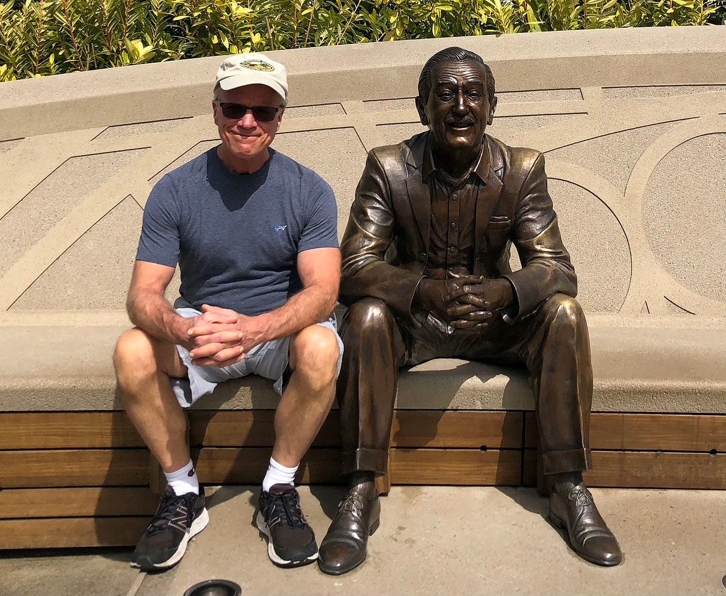 Arthur Levine with Walt Disney statue at Dreamers Point