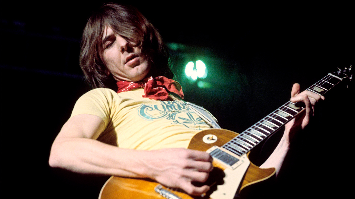 Mick Ralphs performing on stage with Bad Company in the mid 1970s