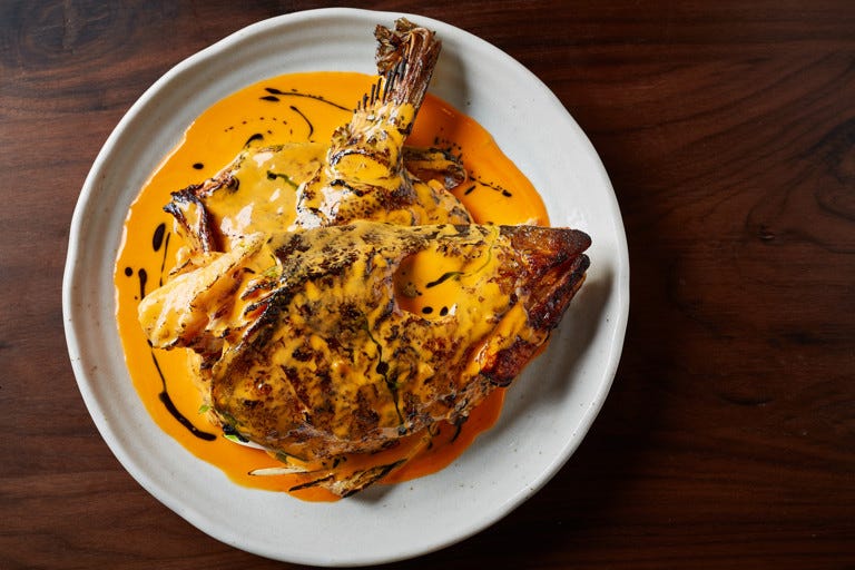 Cod’s head with sriracha butter sauce