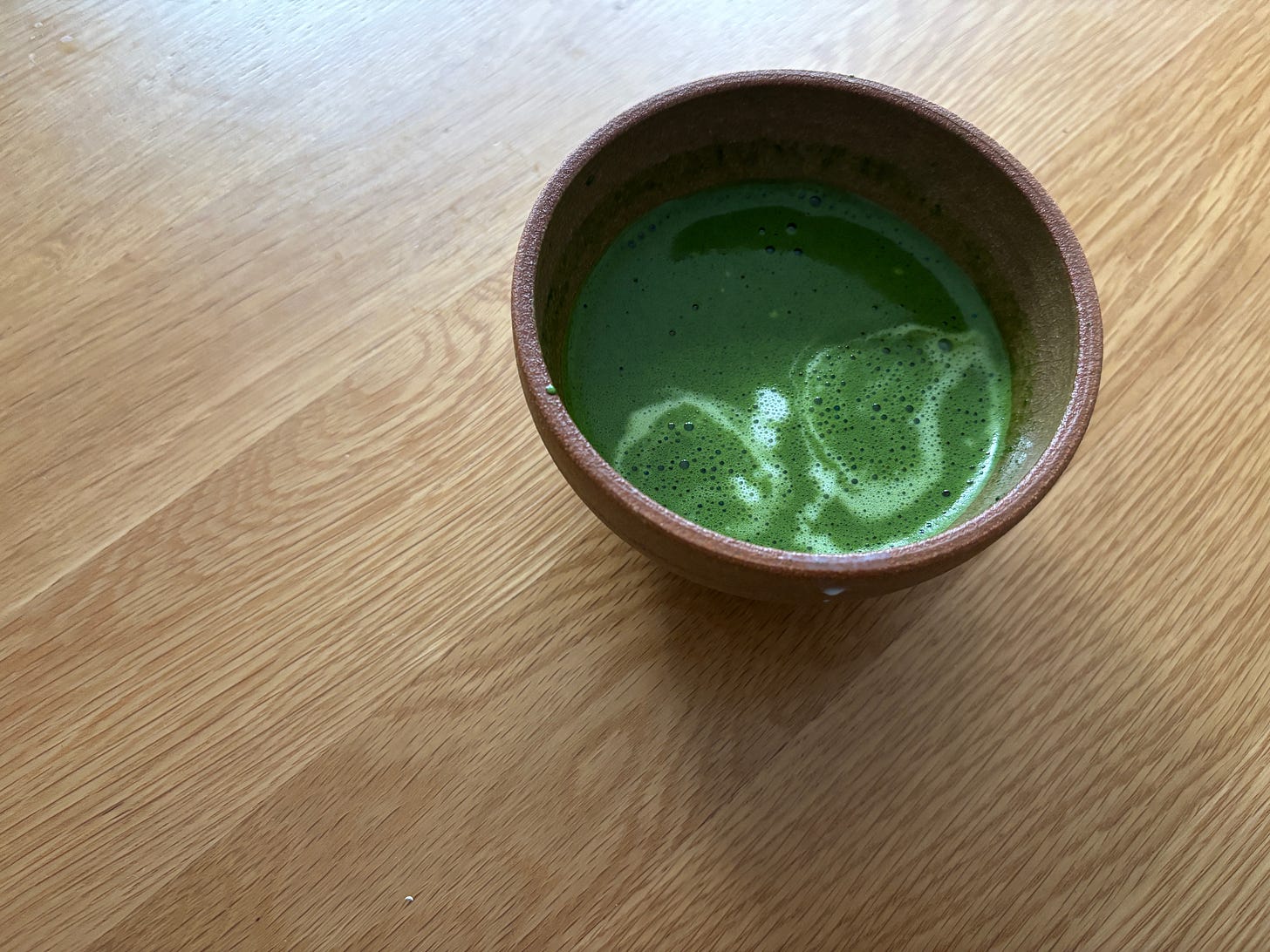 A beautiful footed bowl with green tea
