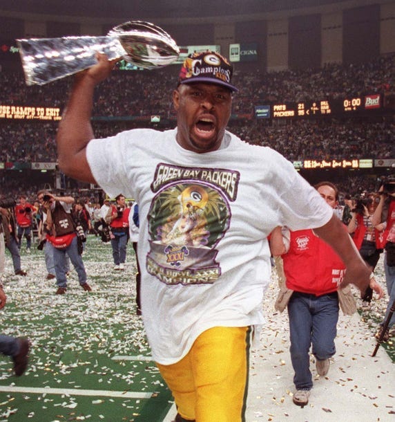 Photos of Reggie White through the years with the Green Bay Packers