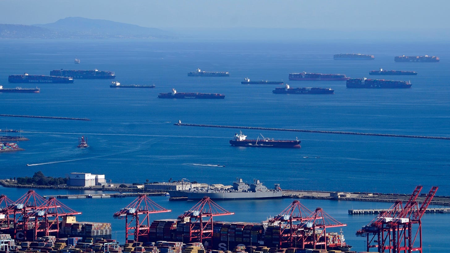 Cargo ships are seen lined up outside the Port of Los Angeles. Cargo ships are seen lined up outside the Port of Los Angeles.