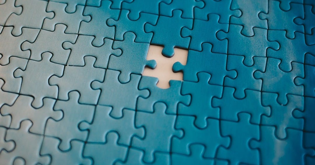 A piece of a puzzle with a missing piece