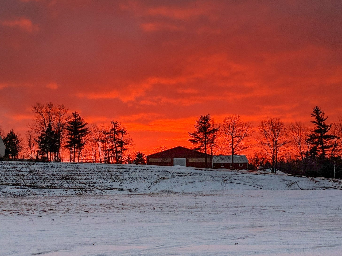 Sunrise over a barn