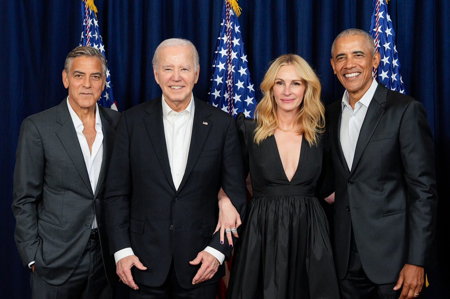 Actor George Clooney, President Joe Biden, Actress Julia Roberts, and President Barack Obama smile for a picture. Actor George Clooney, President Joe Biden, Actress Julia Roberts, and President Barack Obama smile for a picture.