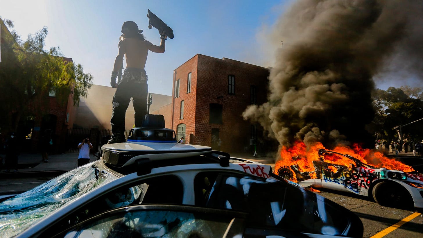 Photos show Waymo vehicles on fire during L.A. protests as company cuts  service – NBC10 Philadelphia
