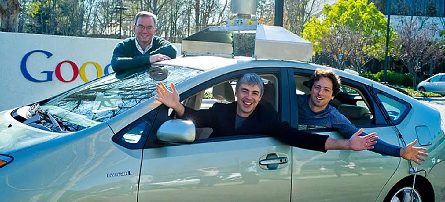 Larry Page, Sergey Brin, and Eric Schmidt testing Google self-driving car Larry Page, Sergey Brin, and Eric Schmidt testing Google self-driving car