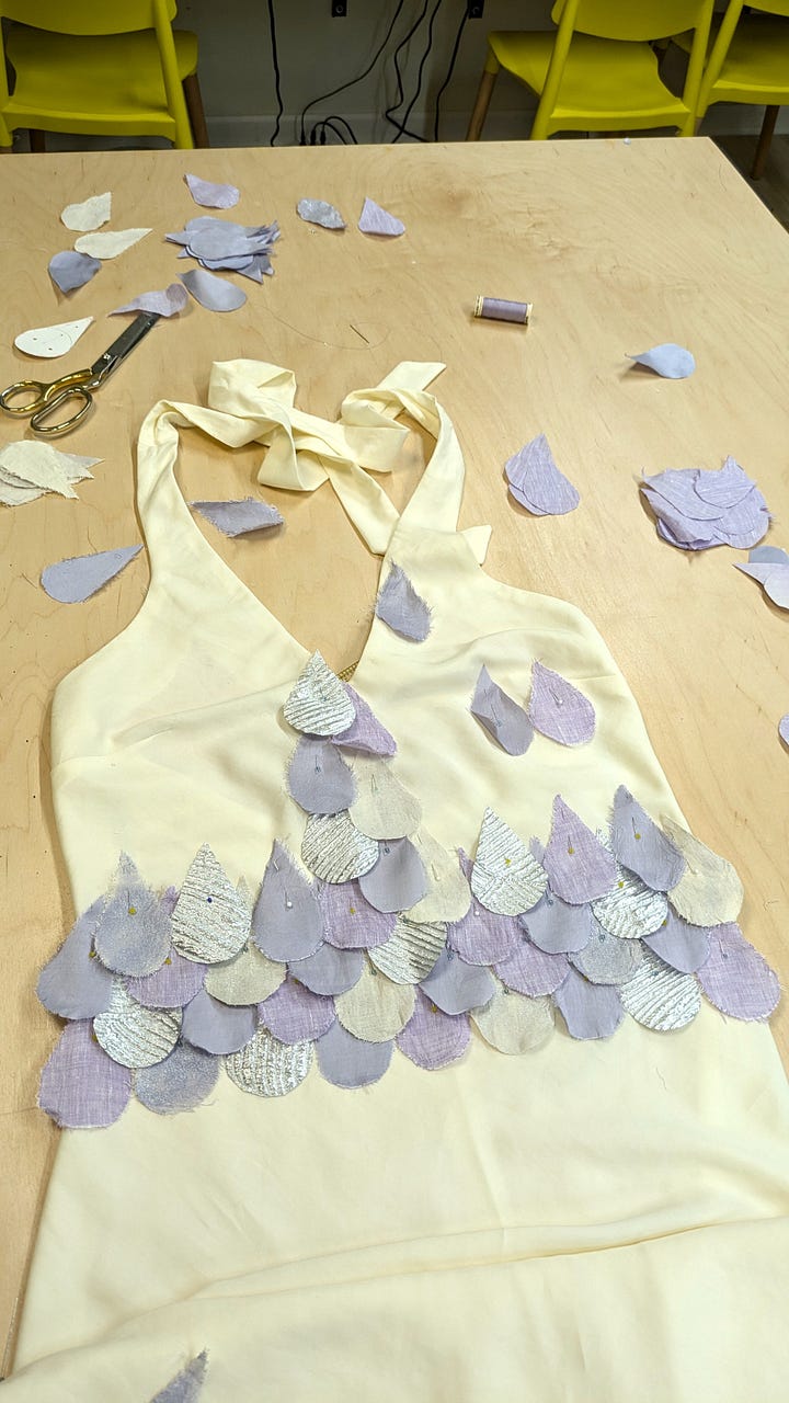 Close ups of the dress scales in progress