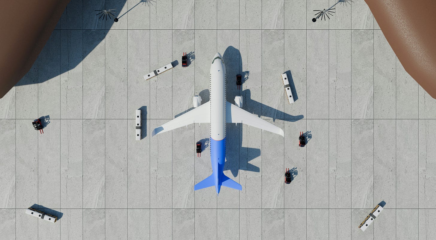 An overhead photo of an airplane on the tarmc. An overhead photo of an airplane on the tarmc.