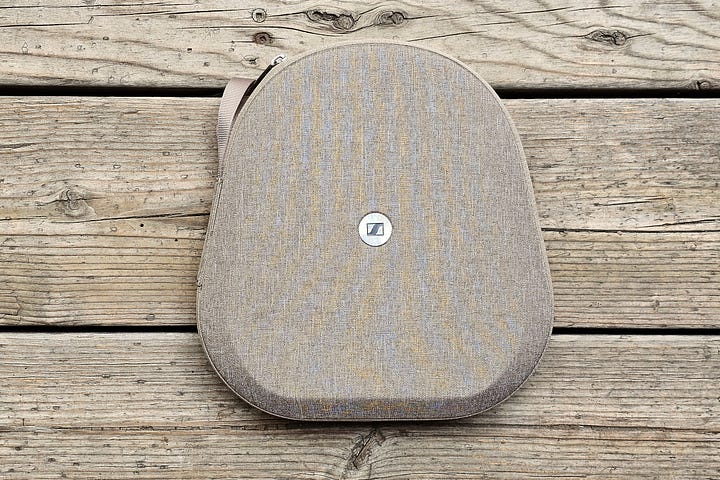 Sennheiser Momentum 5 Wireless travel case seen open and closed.
