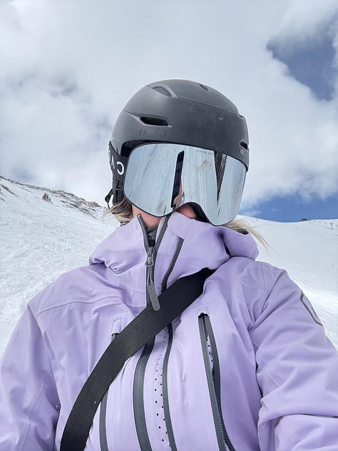 A photo gallery featuring moments from daily life and wellness: a charcuterie board, a cozy dog lounging on a bed, snowy mountain scenes, skiing, smiling couple, a local Boulder shop sign, spring flowers, a knit project, and a scenic desert hike.” This keeps it keyword-relevant (wellness, nature, lifestyle, Boulder, cozy, daily moments) and descriptive enough for accessibility.
