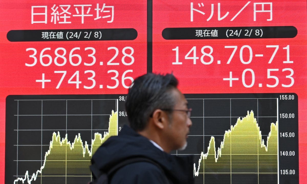 Japan loses crown as world's third-largest economy after it slips into recession | Japan | The Guardian