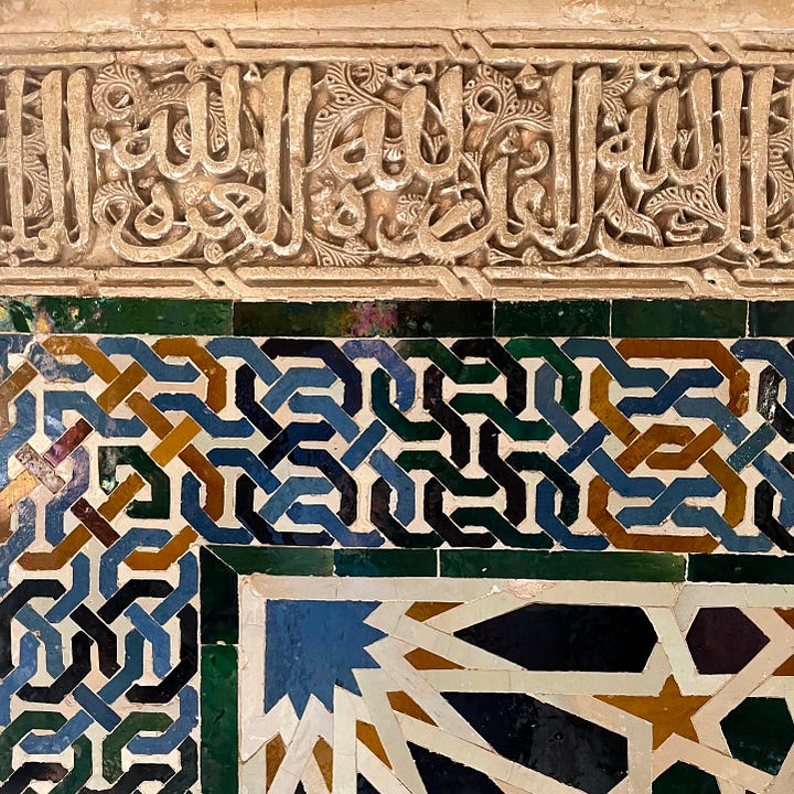 Author wandering the stone walls of the Alhambra