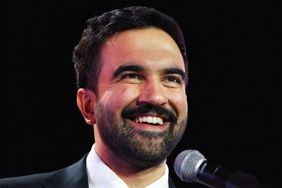 New York Mayoral Candidate Zohran Mamdani reacts during an election rally with Sen. Bernie Sanders (I-VT) and U.S. Rep. Alexandria Ocasio-Cortez (D-NY) at Forest Hills Stadium on October 26, 2025 in the Queens borough of New York City. New York Mayoral Candidate Zohran Mamdani reacts during an election rally with Sen. Bernie Sanders (I-VT) and U.S. Rep. Alexandria Ocasio-Cortez (D-NY) at Forest Hills Stadium on October 26, 2025 in the Queens borough of New York City.
