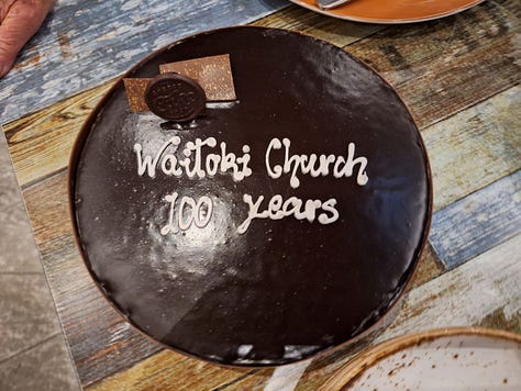 Celebration cake,  Rev Pat Jacobsen cuts the cake, Group of past, present and future leaders of the Waitoki congretation