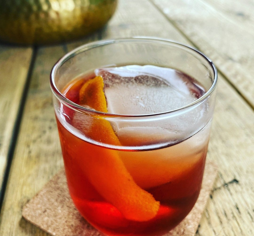 clear drinking glass with orange juice