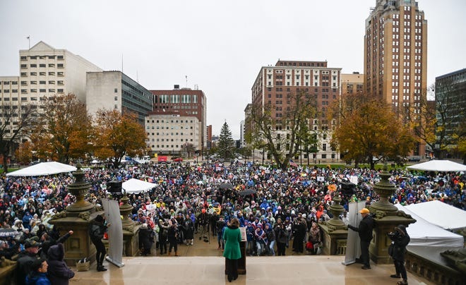 Hundreds gather on the Capitol lawn, Wednesday, Nov. 8, 2023, for the Michigan March for Life rally in Lansing. The event was organized by Michigan Right to Life.