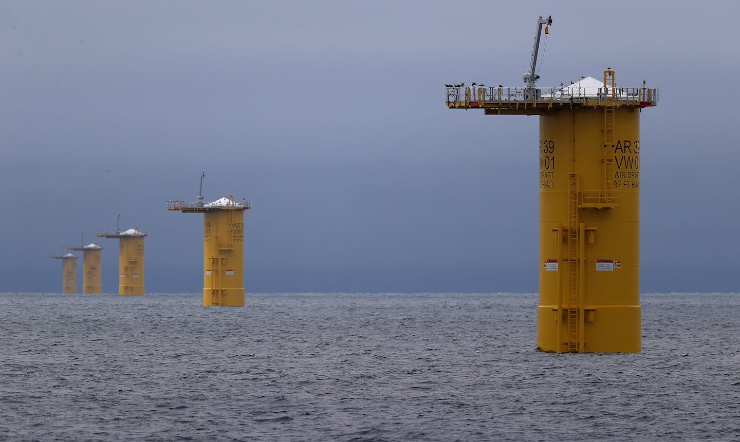 Pilings for offshore wind turbines being installed as part of the Vineyard Wind project. Pilings for offshore wind turbines being installed as part of the Vineyard Wind project.