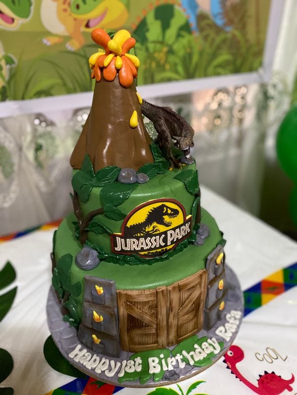 Dinosaur-themed cake from Cakes, Cookies, & Co. for our kiddie birthday party at home Dinosaur-themed cake from Cakes, Cookies, & Co. for our kiddie birthday party at home