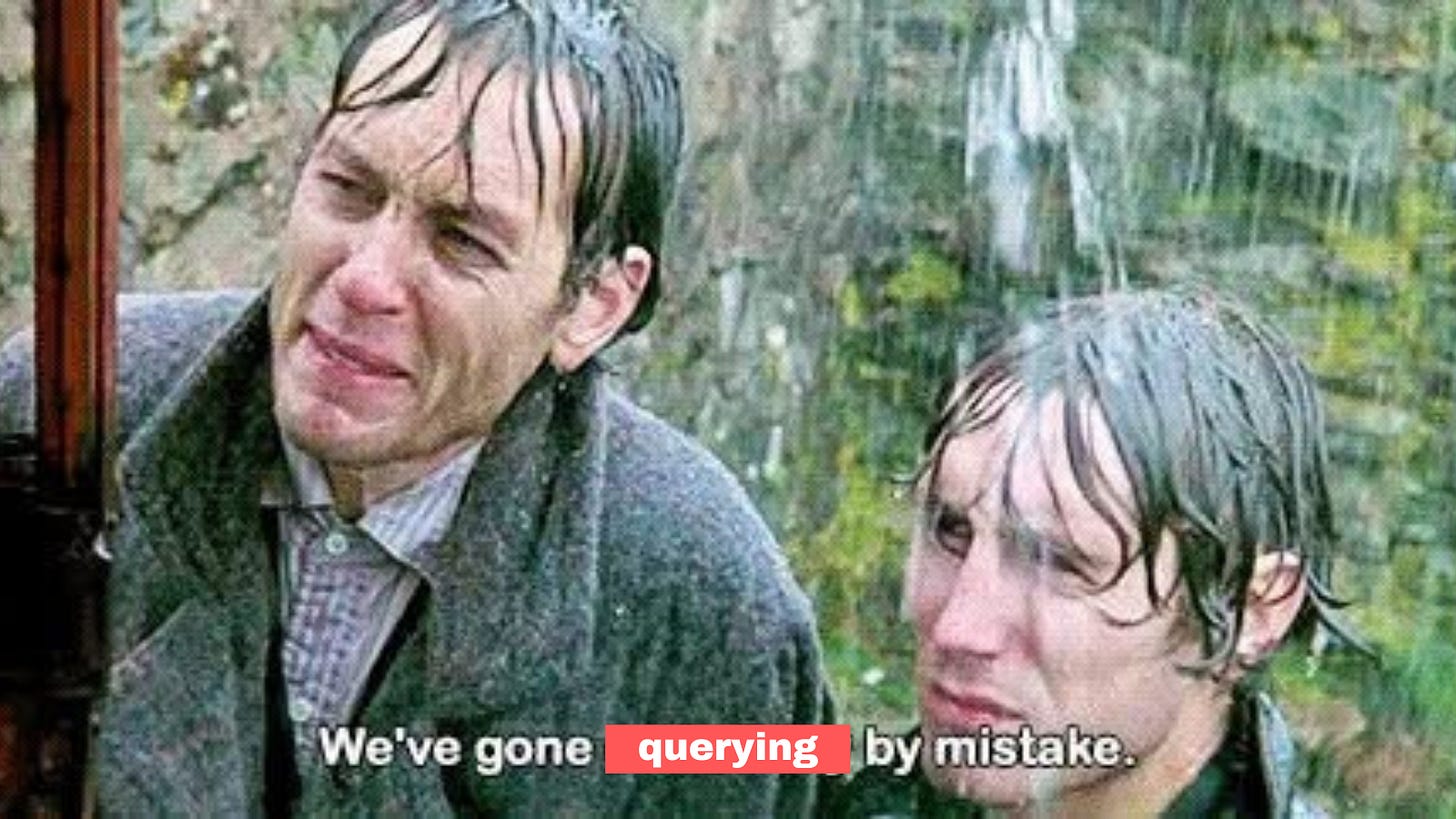 A picture of WIthnail & I stood in a doorway in the rain. The caption reads "We've gone querying by mistake", the word 'querying' has been stuck over the top of the real words in red.