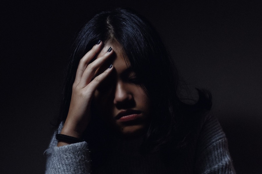 Young lady feeling sad and burned out Young lady feeling sad and burned out
