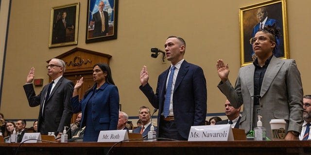 From left, James Baker, former deputy general counsel at Twitter Inc.; Vijaya Gadde, former chief legal officer of Twitter Inc.; Yoel Roth, former global head of trust and safety at Twitter Inc.; and Anika Collier Navaroli, former employee at Twitter Inc., are sworn in during a House Oversight and Accountability Committee hearing in Washington, D.C., on Wednesday.