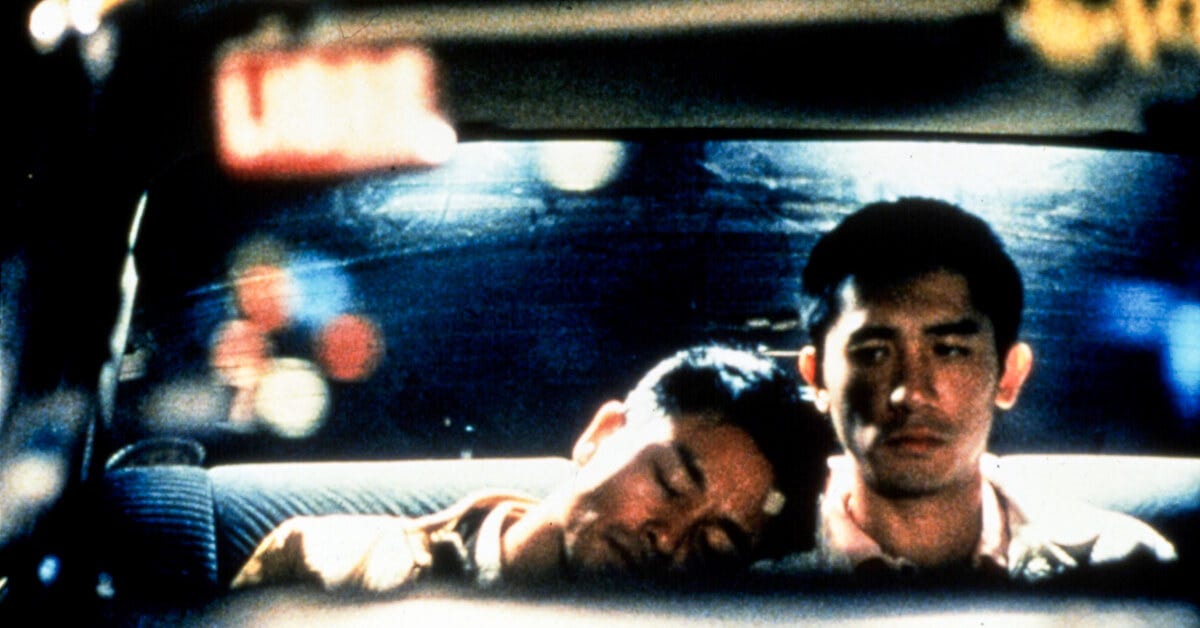 Leslie Cheung leans asleep on the shoulder of Tony Leung in the back of a Buenos Aires taxi cab in Wong Kar-wai's groundbreaking Happy Together (1997). Leslie Cheung leans asleep on the shoulder of Tony Leung in the back of a Buenos Aires taxi cab in Wong Kar-wai's groundbreaking Happy Together (1997).