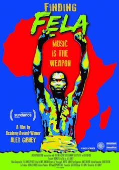A film poster with a graphic of a shirtless man, both fists in the air.