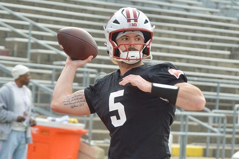 Wisconsin quarterbacks participate in individual position drills during Saturday's spring practice inside Camp Randall Stadium.