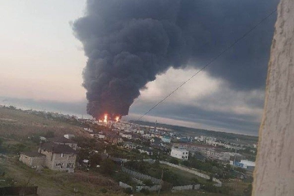 A massive plume of smoke rises above fuel infrastructure in occupied Kerch following a reported drone strike on June 21, 2026. (Photo: Open source)