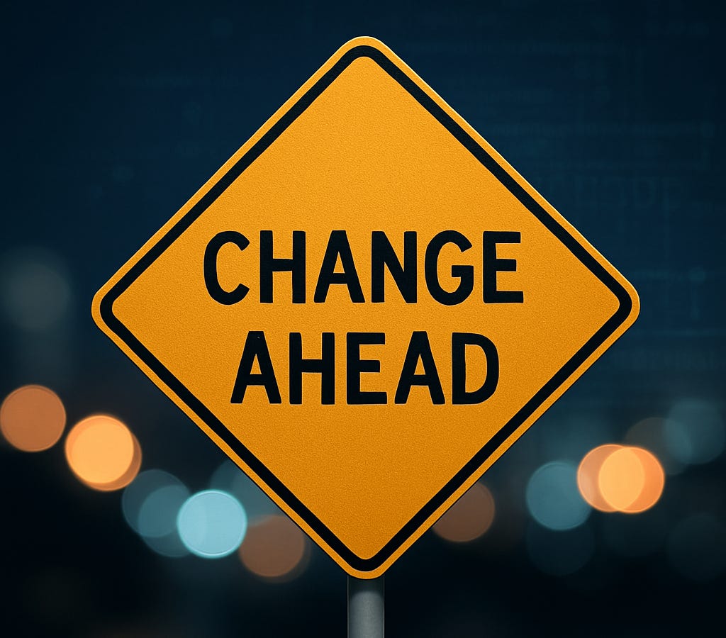 A glowing yellow road sign that reads “Change Ahead,” standing against a blurred background of city lights with subtle digital code patterns, symbolizing rapid shifts in technology and life. A glowing yellow road sign that reads “Change Ahead,” standing against a blurred background of city lights with subtle digital code patterns, symbolizing rapid shifts in technology and life.
