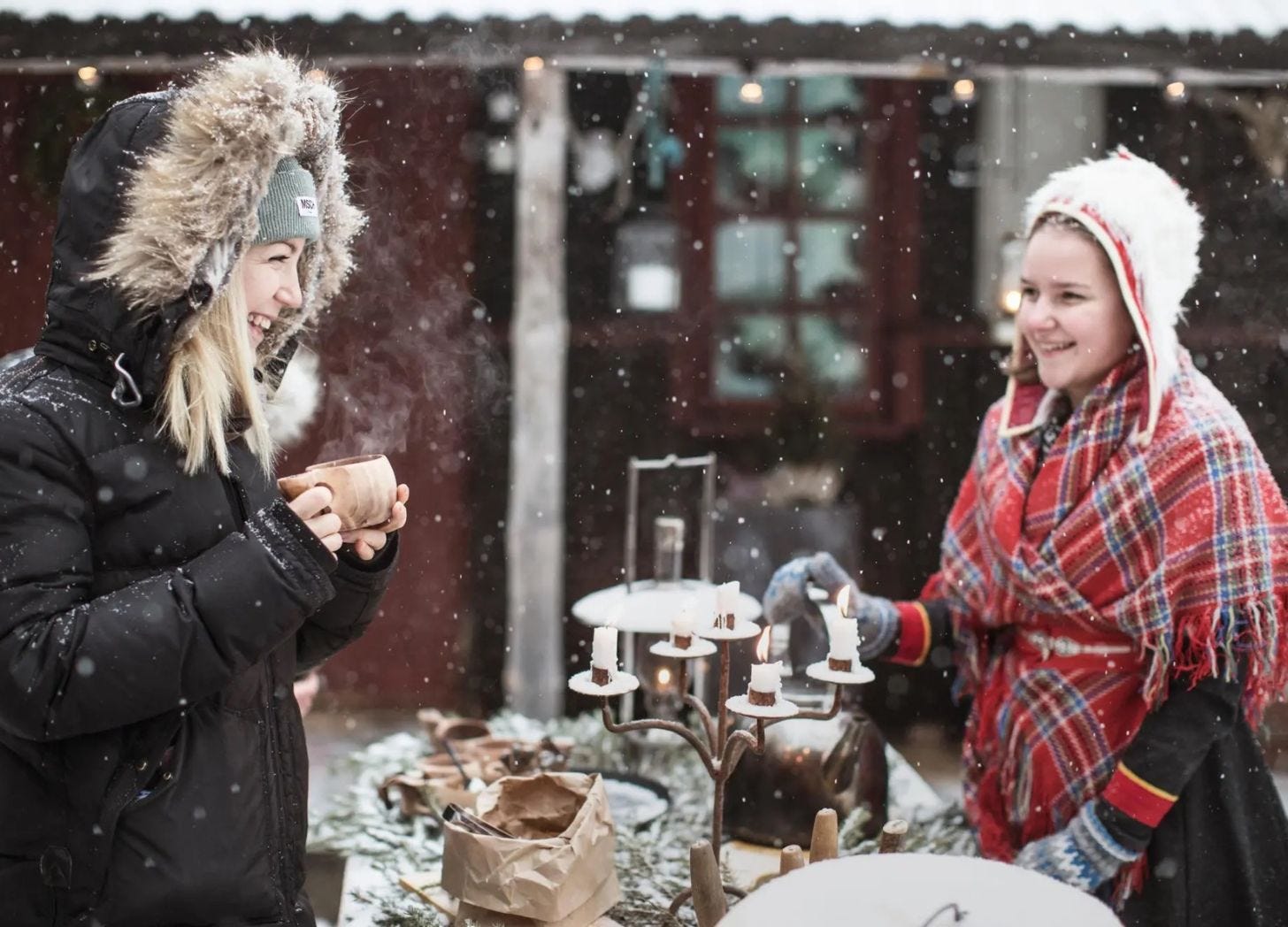 two swedish women enjoying the snow and coffee two swedish women enjoying the snow and coffee