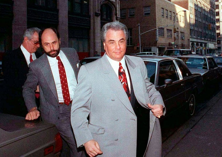 John Gotti (right) arrives at court in New York on Feb. 9, 1990. The Gambino family was once among the most powerful criminal organizations in the U.S., but federal prosecutions in the 1980s and 1990s sent Gotti and other top leaders to prison, diminishing its reach. The last Mafia boss to be shot to death in New York City was Gambino don Paul Castellano, assassinated outside a Manhattan steakhouse in 1985 at the direction of Gotti, who then took over the organization.