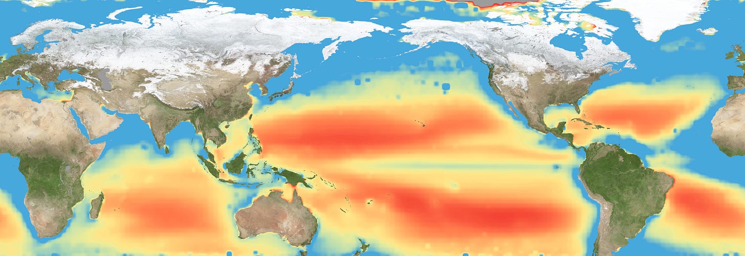 A flat map of the world shows regions in the ocean colored red to indeicate elevated levels of stress on plankton due to a lack of nutrients.