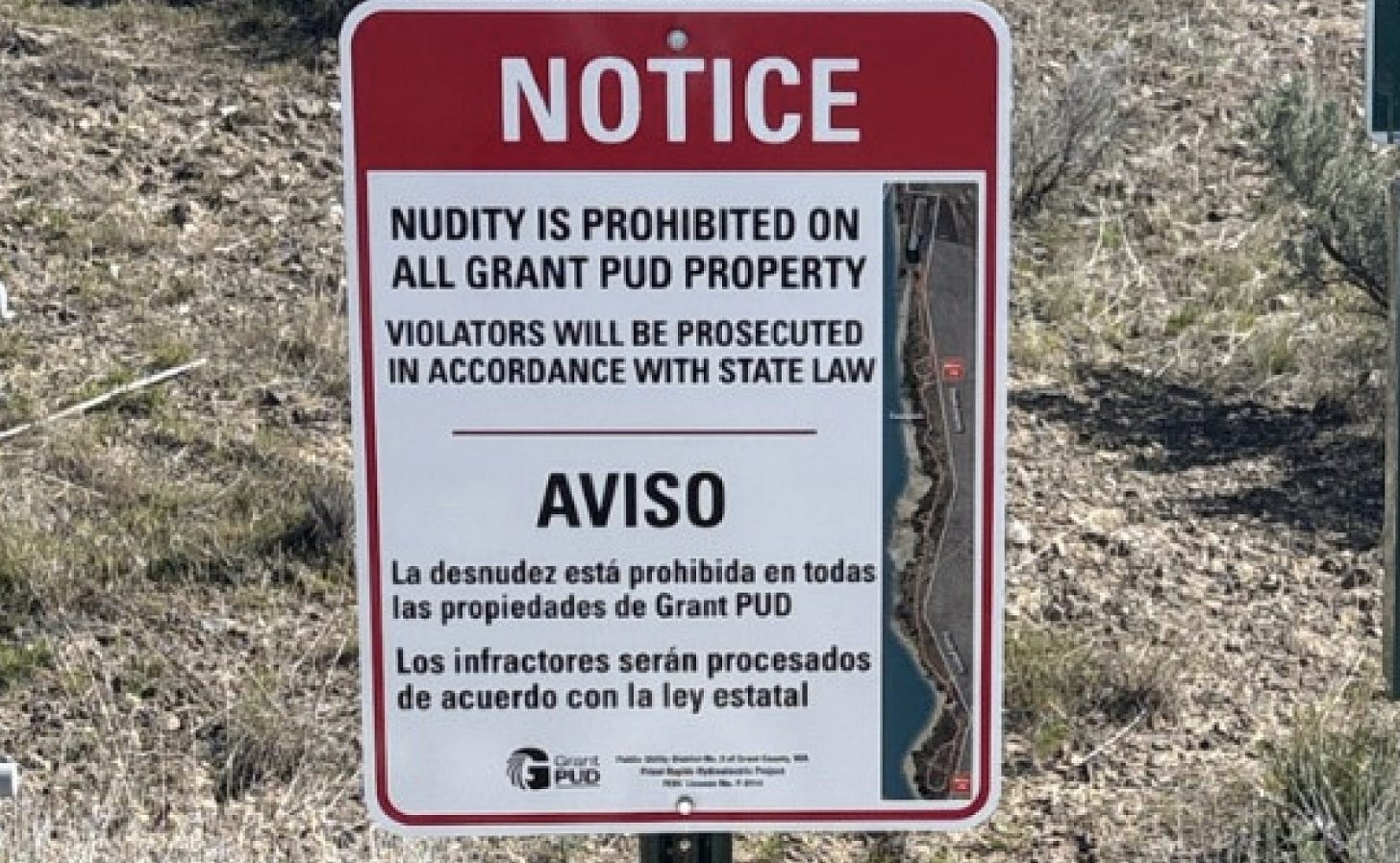 A sign reads "NOTICE: NUDITY IS PROHIBITED ON ALL GRANT PUD PROPERTY."