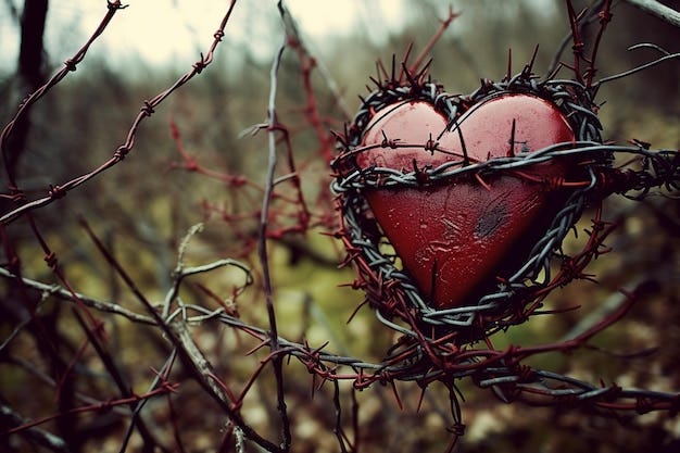 Premium Photo | Heart with barbed wire Premium Photo | Heart with barbed wire