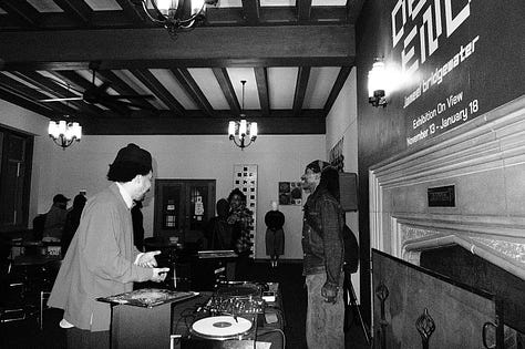L to R: all photographs are black-and-white; blair ebony smith stands at the turn tables in front of a fireplace. behind blair the words ‘end jameel bridgewater’ are visible. there is someone standing next to blair; the middle photograph is of several folks smiling and laughing around the turn tables; blair ebony smith again standing at the turntables