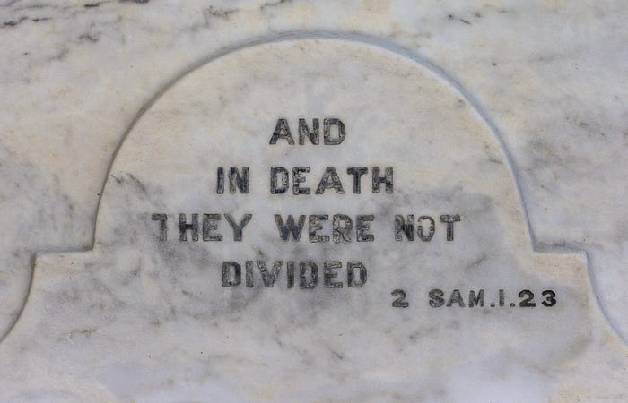 An inscription upon a headstone: And in death, they were not divided. An inscription upon a headstone: And in death, they were not divided.