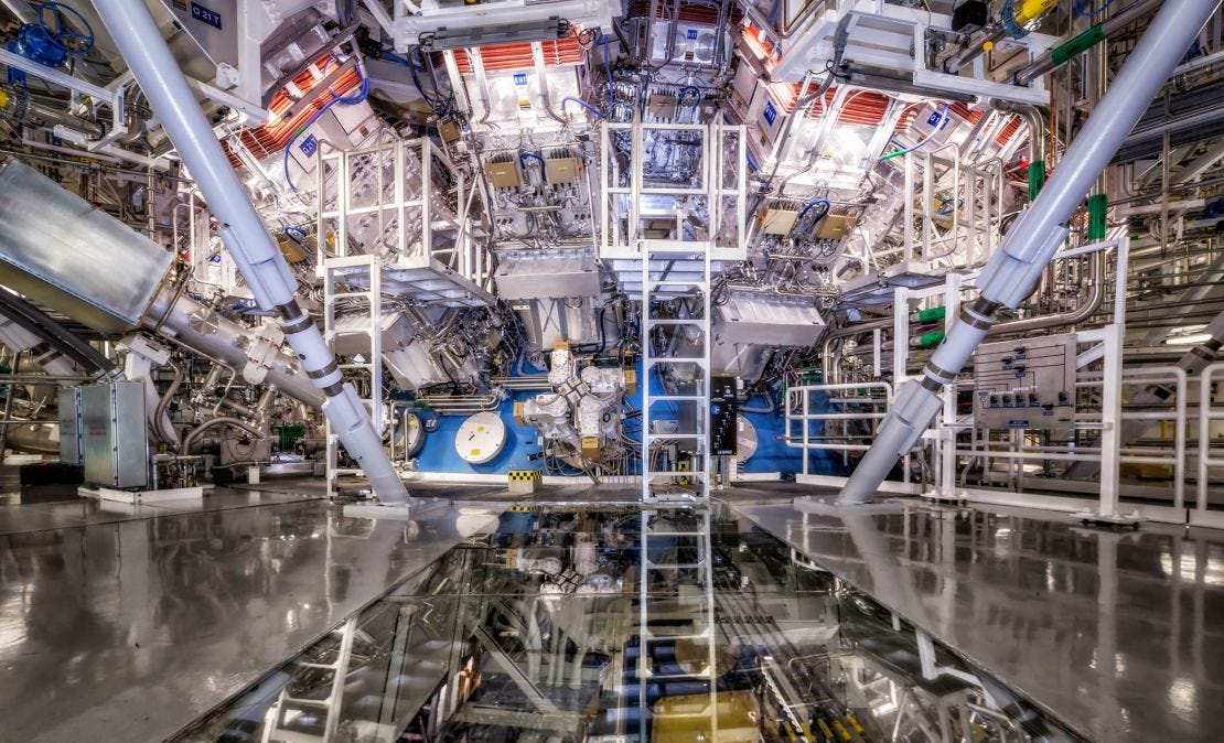 NIF's target chamber is where the magic happens -- temperatures of 100 million degrees and pressures extreme enough to compress the target to densities up to 100 times the density of lead are created there. NIF's target chamber is where the magic happens -- temperatures of 100 million degrees and pressures extreme enough to compress the target to densities up to 100 times the density of lead are created there.