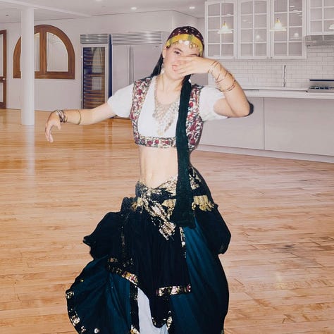 The author in a variety of belly dance costumes from her restaurant days.