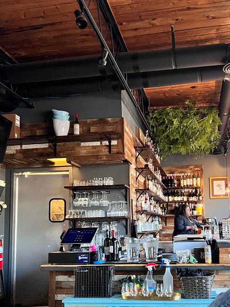 Inside images from Watkins bourbon and brasserie bar area and dining area