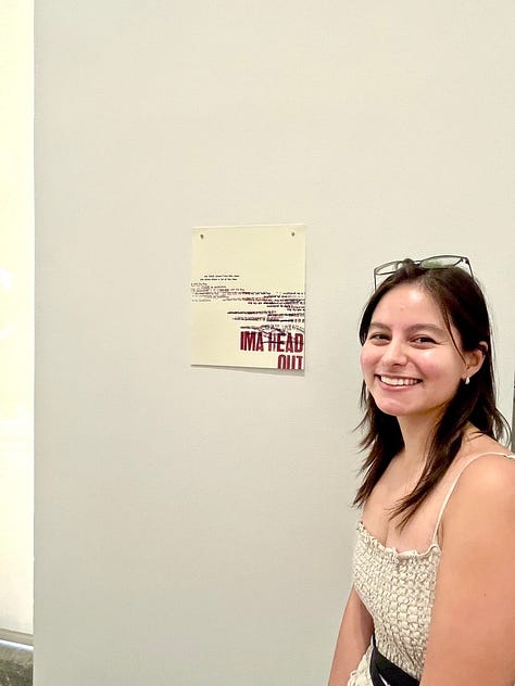 images of artists standing next to their artworks