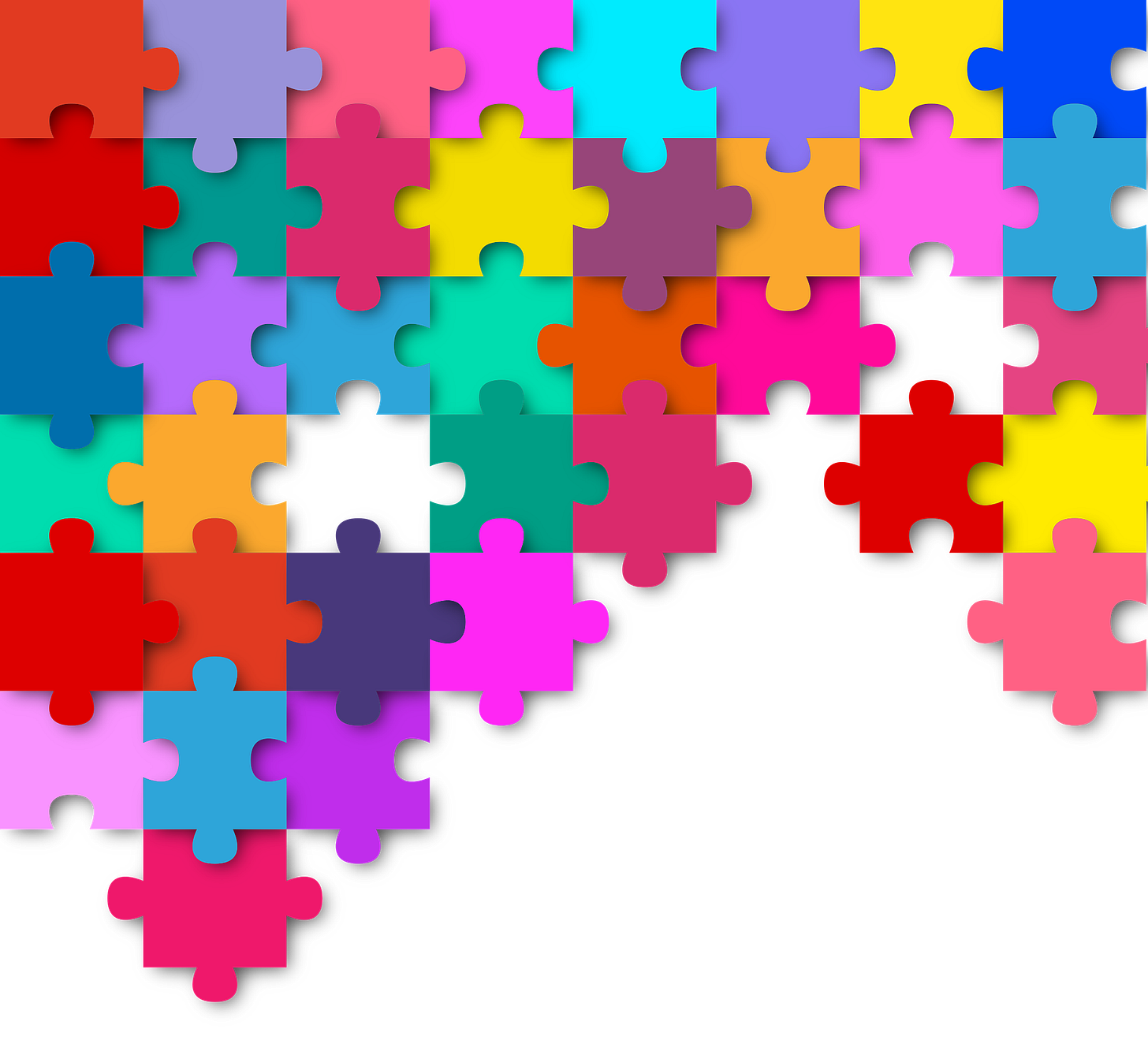 An arrangement of multicolored, interlocking puzzle pieces.