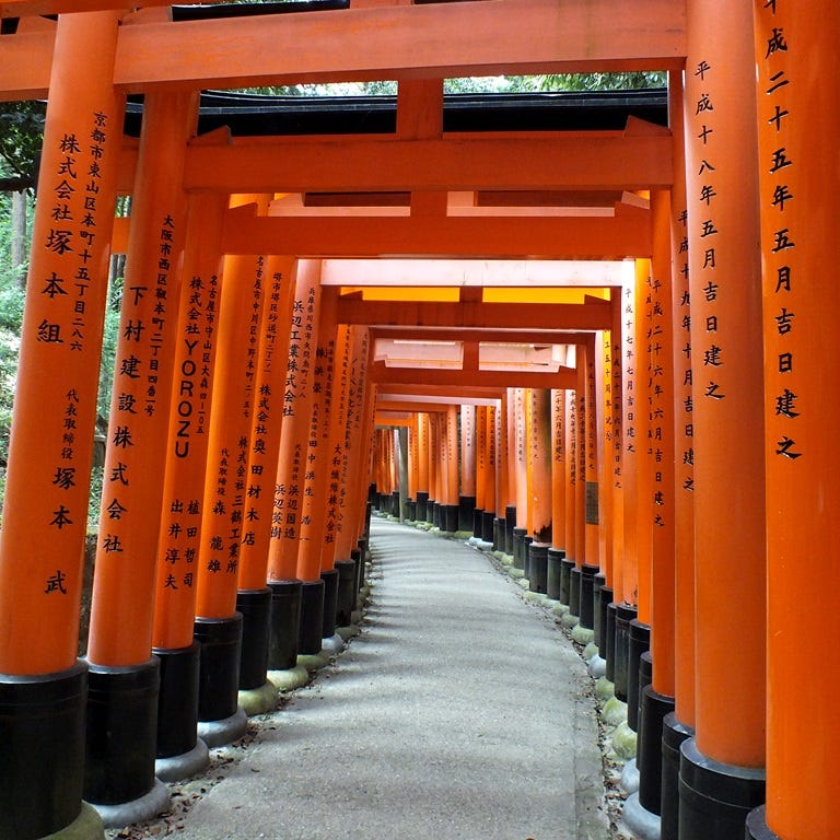 Climbing Mount Inari logo