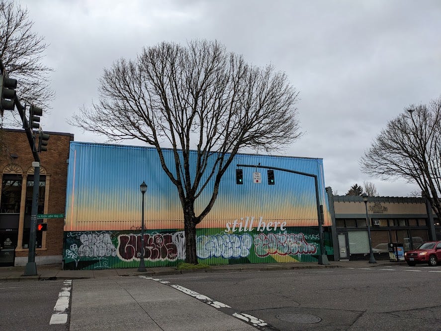 a building that says "still here"