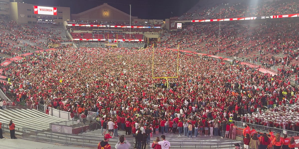 Wisconsin football fans storm Camp Randall Stadium field after upset win vs. No. 16 USC
