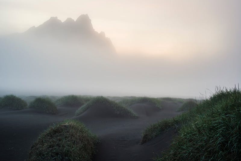 Fog veils the mountain Vestrahorn on the Stokksnes peninsula, Iceland Fog veils the mountain Vestrahorn on the Stokksnes peninsula, Iceland