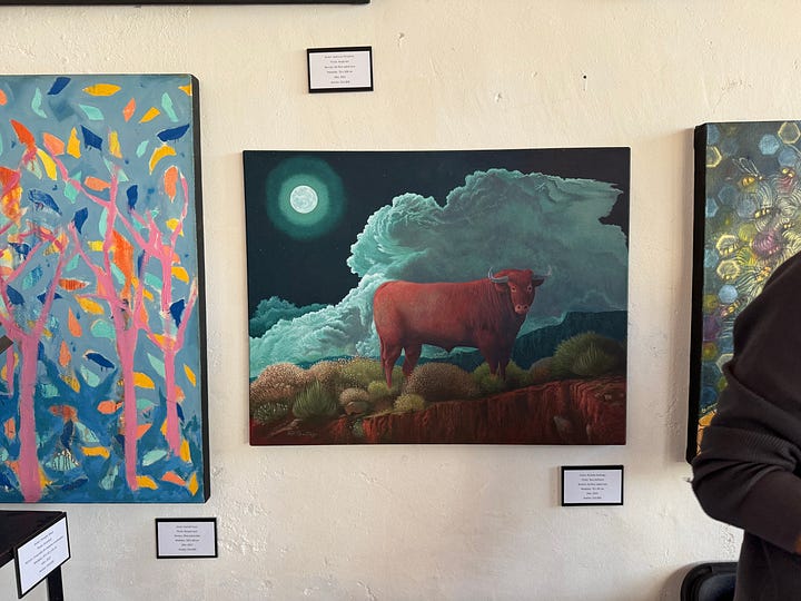 A selection of paintings and mixed media art.