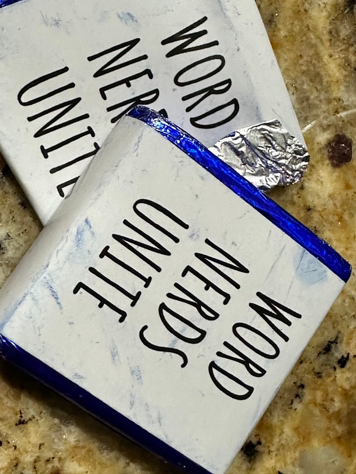 A personalized book, signed by the author; candy with grammar inscriptions on the cover