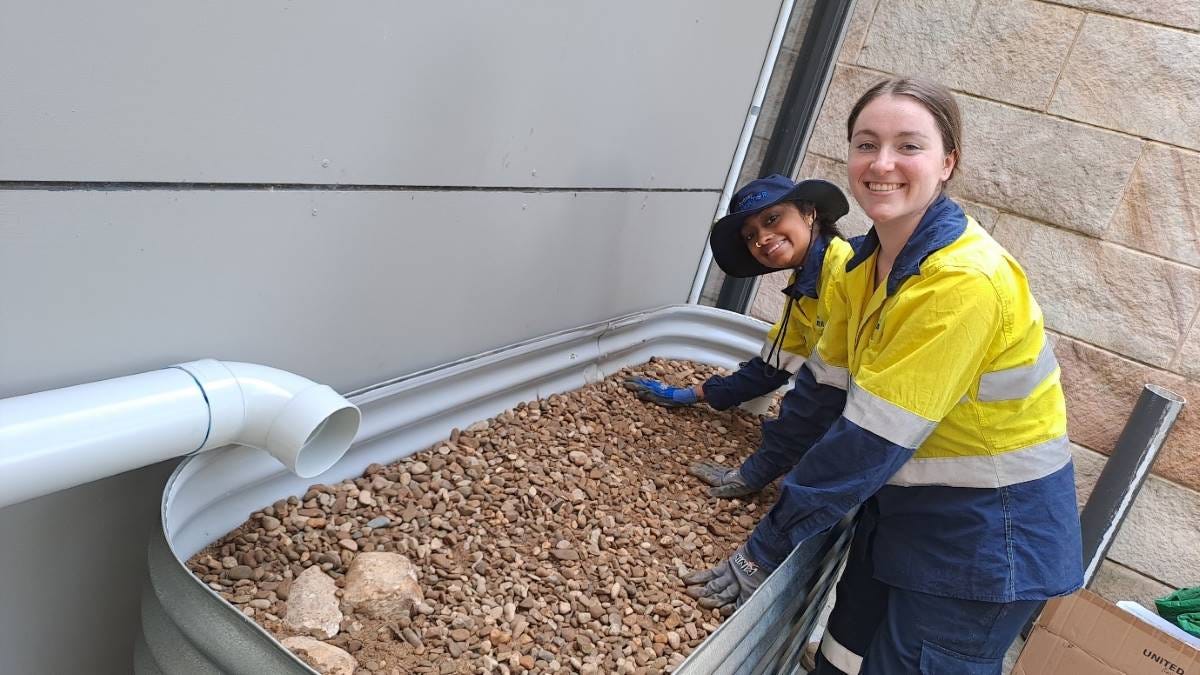 Sydney Water, represented by Graduate Environmental Scientists Lauren and Shreya, partnered with BMCC to help make the rain gardens a reality. Sydney Water, represented by Graduate Environmental Scientists Lauren and Shreya, partnered with BMCC to help make the rain gardens a reality.
